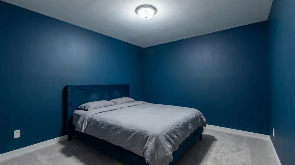 Contemporary Blue Bedroom with Layered Lighting